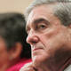 Then FBI Director Robert Mueller testifying on Capitol Hill in Washington, Wednesday, Sept. 22, 2010, before the Senate Homeland Security and Government Affairs Committee.